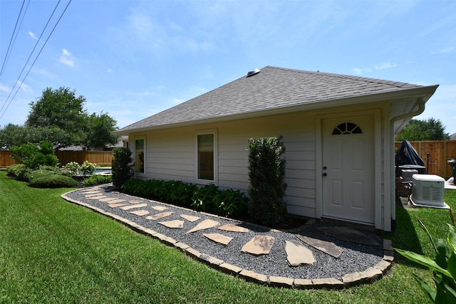 21006 Refuge Creek Dr, Cypress, TX 77433 - back of property featuring roof with shingles and central AC unit