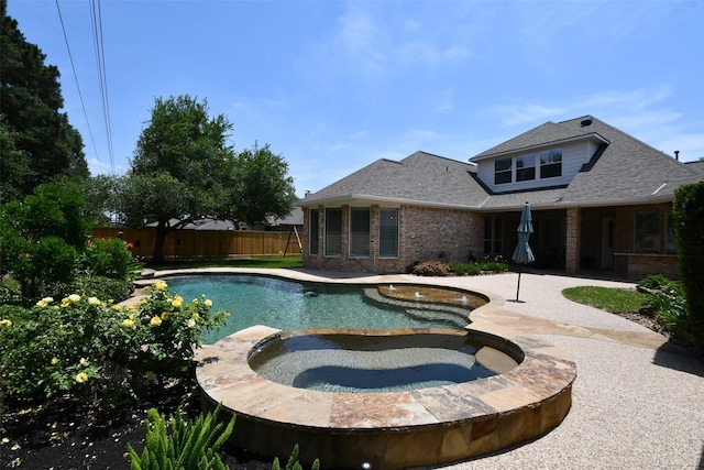 21006 Refuge Creek Dr, Cypress, TX 77433 - view of swimming pool featuring a fenced backyard, a patio, and a pool with connected hot tub