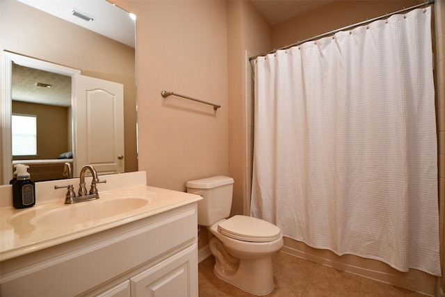 21006 Refuge Creek Dr, Cypress, TX 77433 - full bath with vanity, toilet, tile patterned flooring, and shower / tub combo