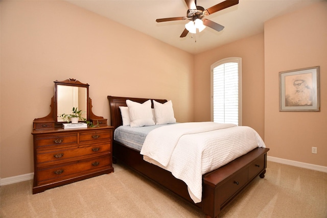 21006 Refuge Creek Dr, Cypress, TX 77433 - bedroom with light colored carpet, baseboards, and ceiling fan