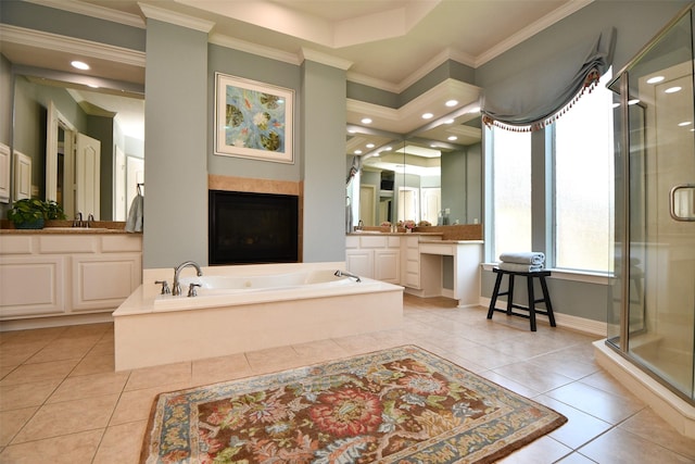 21006 Refuge Creek Dr, Cypress, TX 77433 - bathroom with tile patterned flooring, a shower stall, a bath, ornamental molding, and vanity
