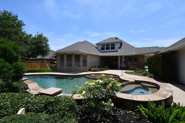 21006 Refuge Creek Dr, Cypress, TX 77433 - view of swimming pool with a pool with connected hot tub and a patio