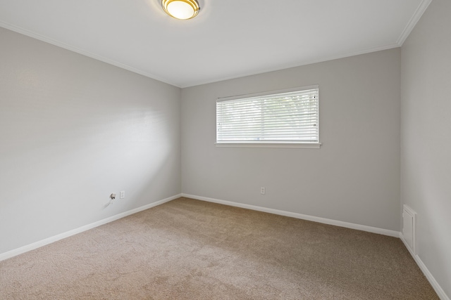 6003 Green Falls Dr, Houston, TX 77088 - unfurnished room with carpet floors, crown molding, and baseboards