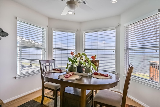 1309 Blue Heron St, Bayou Vista, TX 77563 - dining space with baseboards, ceiling fan, wood finished floors, and recessed lighting