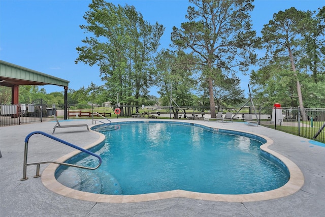12 Oakland Ct, Huntsville, TX 77340 - community pool featuring a patio