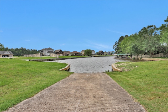 12 Oakland Ct, Huntsville, TX 77340 - water view featuring a boat ramp and nearby suburban area