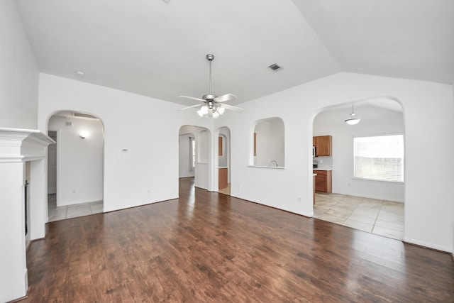 19130 Center Park Dr, Spring, TX 77373 - unfurnished living room featuring ceiling fan, light wood-type flooring, and lofted ceiling