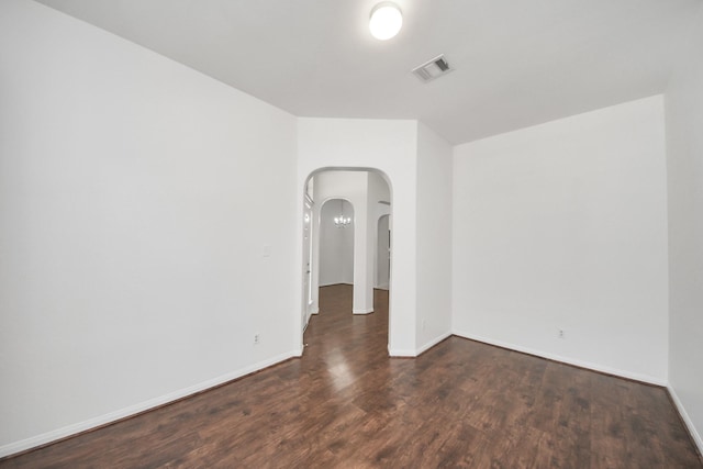 19130 Center Park Dr, Spring, TX 77373 - unfurnished room featuring wood finished floors, arched walkways, and baseboards