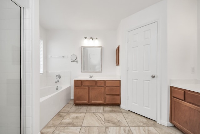 19130 Center Park Dr, Spring, TX 77373 - full bath featuring vanity, a garden tub, tiled shower, and marble finish floors