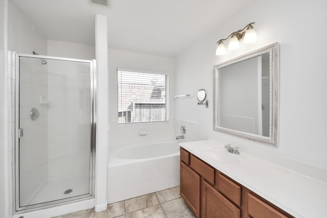 19130 Center Park Dr, Spring, TX 77373 - bathroom featuring a shower stall, a garden tub, and vanity