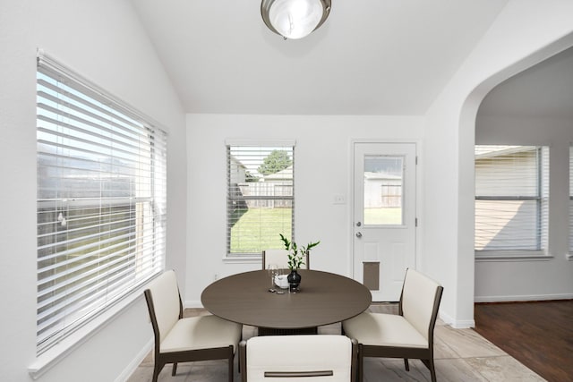 19130 Center Park Dr, Spring, TX 77373 - dining space with arched walkways and lofted ceiling