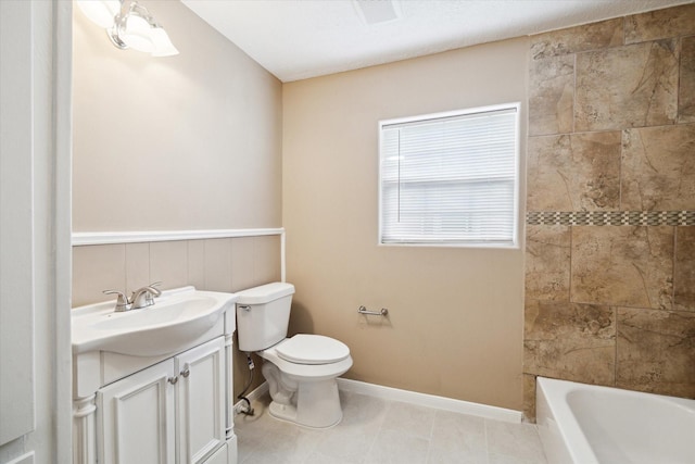 1904 Kansas St, Baytown, TX 77520 - bathroom with toilet, vanity, and tile patterned floors