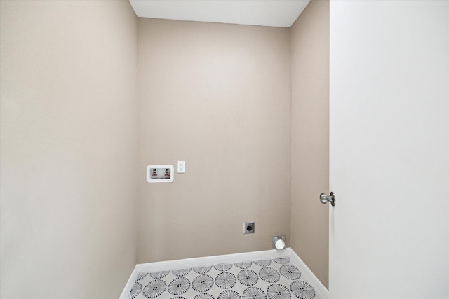 1904 Kansas St, Baytown, TX 77520 - washroom featuring washer hookup, baseboards, and electric dryer hookup