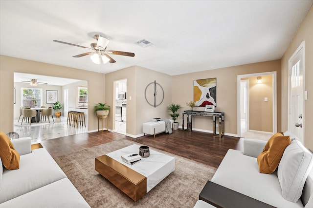 1904 Kansas St, Baytown, TX 77520 - living room with ceiling fan and wood finished floors