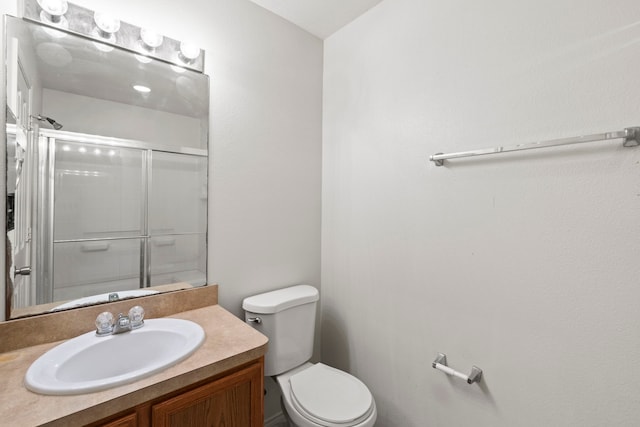 23831 Single Oak St, Spring, TX 77373 - full bath featuring a shower with shower door, toilet, and vanity