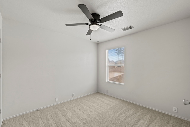 23831 Single Oak St, Spring, TX 77373 - spare room featuring carpet floors, a ceiling fan, and baseboards