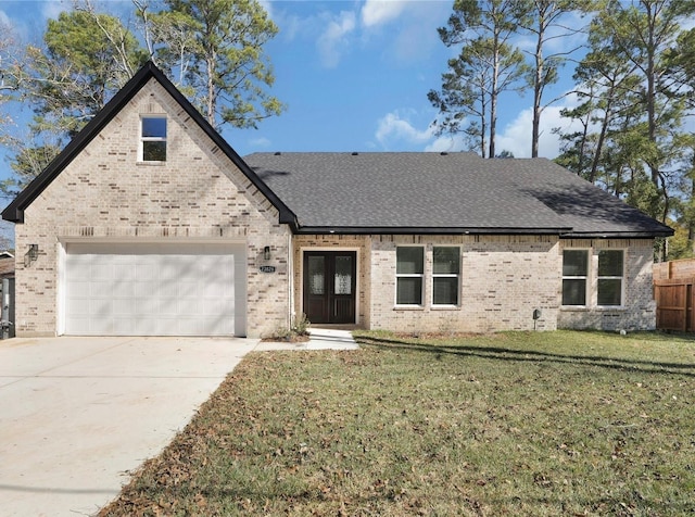23826 Cow Oak Dr, Spring, TX 77389 - view of front of home with brick siding, concrete driveway, and a shingled roof