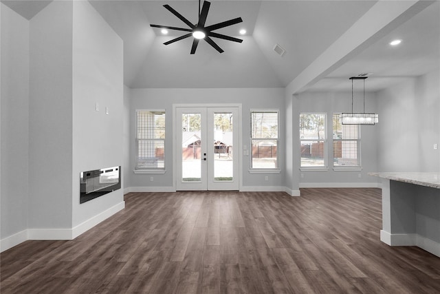 23826 Cow Oak Dr, Spring, TX 77389 - unfurnished living room with a ceiling fan, recessed lighting, baseboards, heating unit, and high vaulted ceiling