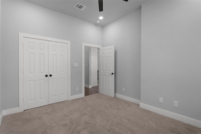 23826 Cow Oak Dr, Spring, TX 77389 - unfurnished bedroom with carpet flooring, a closet, baseboards, and ceiling fan