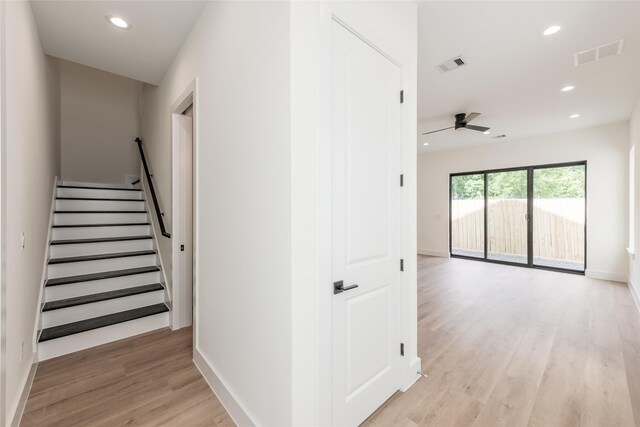 6135 Pacific Forest Dr, Houston, TX 77346 - stairs with wood finished floors, recessed lighting, a ceiling fan, and baseboards
