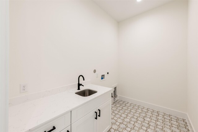 6135 Pacific Forest Dr, Houston, TX 77346 - washroom featuring hookup for an electric dryer, cabinet space, hookup for a washing machine, light flooring, and baseboards