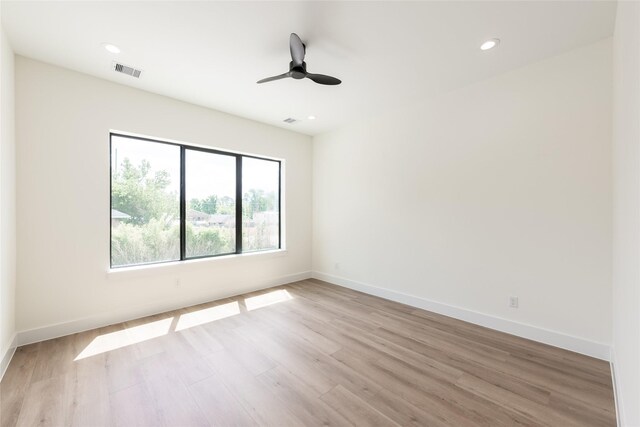 6135 Pacific Forest Dr, Houston, TX 77346 - empty room featuring ceiling fan, light wood-type flooring, baseboards, and recessed lighting