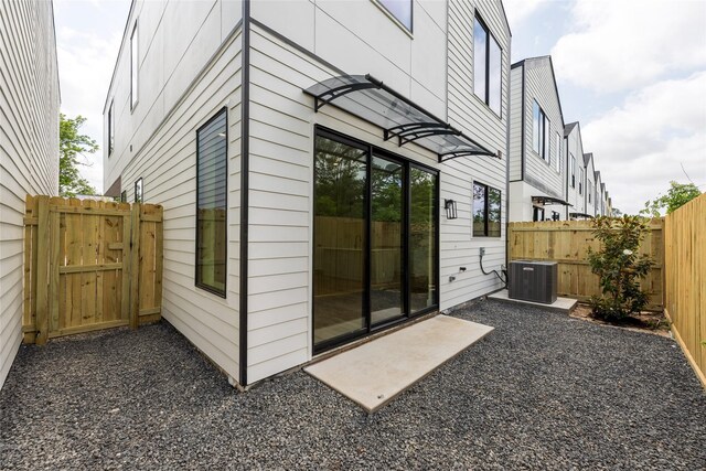 6135 Pacific Forest Dr, Houston, TX 77346 - back of property with central air condition unit