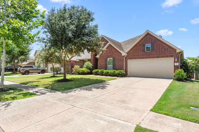 511 Summer Acres Ct, Rosenberg, TX 77469 - view of front of property with brick siding, concrete driveway, and a front yard
