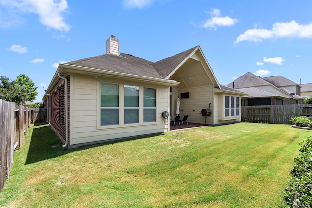 511 Summer Acres Ct, Rosenberg, TX 77469 - back of house featuring a chimney and a patio area