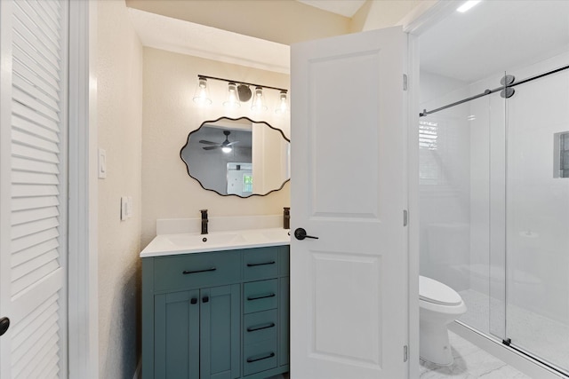 9863 Swan Ct, Conroe, TX 77385 - bathroom with vanity, toilet, a shower stall, and marble finish floors