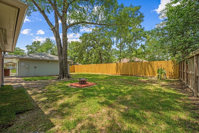 9863 Swan Ct, Conroe, TX 77385 - view of yard featuring a fire pit