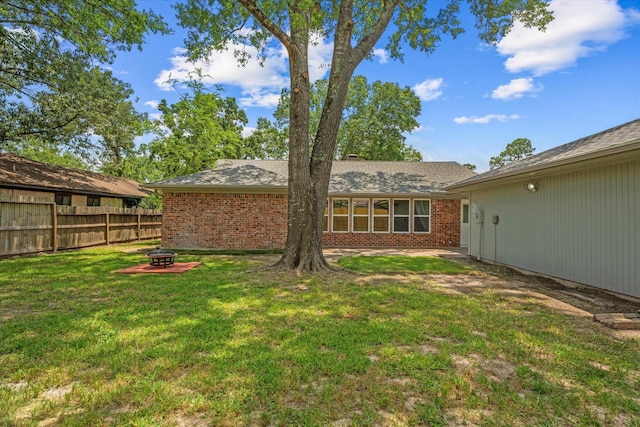9863 Swan Ct, Conroe, TX 77385 - view of yard featuring an outdoor fire pit