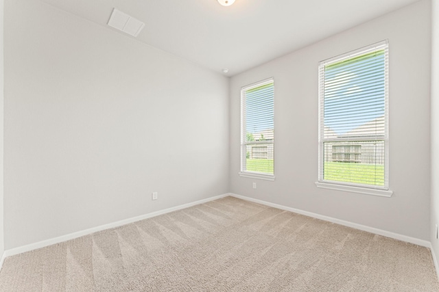 32039 Autumn Orchard Ln, Conroe, TX 77385 - carpeted spare room featuring baseboards and lofted ceiling