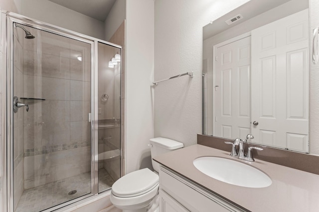 32039 Autumn Orchard Ln, Conroe, TX 77385 - bathroom with toilet, a stall shower, and vanity