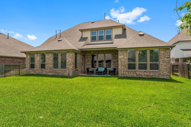 32039 Autumn Orchard Ln, Conroe, TX 77385 - rear view of house featuring an outdoor hangout area, brick siding, a patio, and a shingled roof