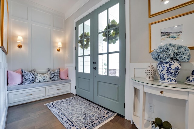 107 E Sawyer Ridge Dr, Spring, TX 77389 - foyer featuring dark wood-type flooring, crown molding, and a decorative wall