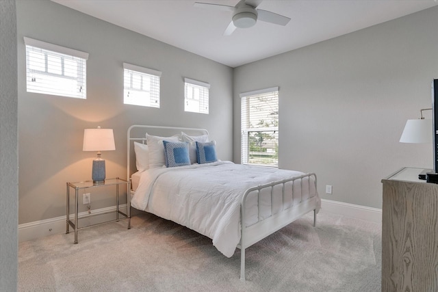 107 E Sawyer Ridge Dr, Spring, TX 77389 - carpeted bedroom featuring baseboards and ceiling fan