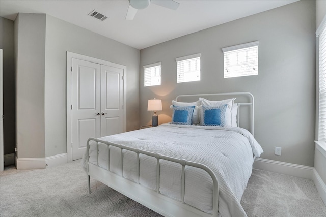 107 E Sawyer Ridge Dr, Spring, TX 77389 - bedroom featuring carpet floors, a closet, a ceiling fan, and baseboards