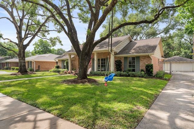 8015 Skyline Dr, Houston, TX 77063 - view of front of property featuring brick siding, a front yard, and a shingled roof