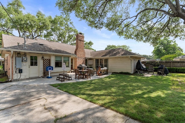 8015 Skyline Dr, Houston, TX 77063 - rear view of property with a patio area, a chimney, and brick siding