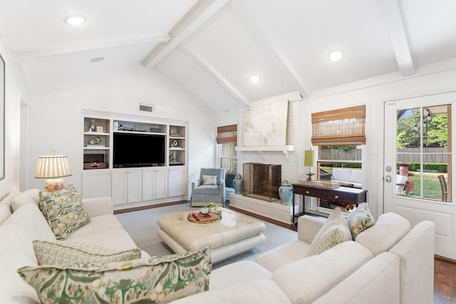 8015 Skyline Dr, Houston, TX 77063 - living area featuring a brick fireplace, wood finished floors, built in features, and recessed lighting