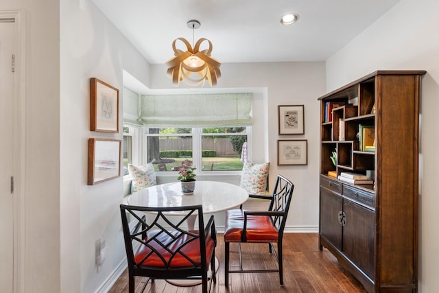 8015 Skyline Dr, Houston, TX 77063 - dining room with dark wood-style flooring, baseboards, and recessed lighting