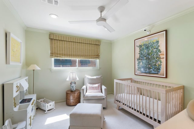 8015 Skyline Dr, Houston, TX 77063 - carpeted bedroom with crown molding, a crib, ceiling fan, and baseboards