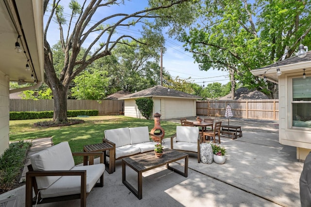 8015 Skyline Dr, Houston, TX 77063 - view of patio / terrace with outdoor lounge area, a garage, an outdoor structure, and outdoor dining area