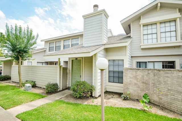 6211 Ludington Dr Unit 21-909, Houston, TX 77035 - multi unit property with roof with shingles and a chimney