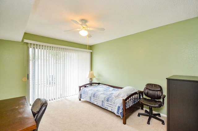 6211 Ludington Dr Unit 21-909, Houston, TX 77035 - bedroom with carpet flooring and a ceiling fan