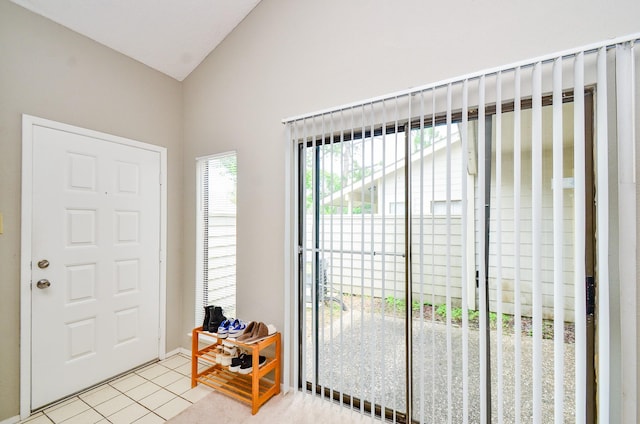 6211 Ludington Dr Unit 21-909, Houston, TX 77035 - entrance foyer featuring lofted ceiling and tile patterned floors
