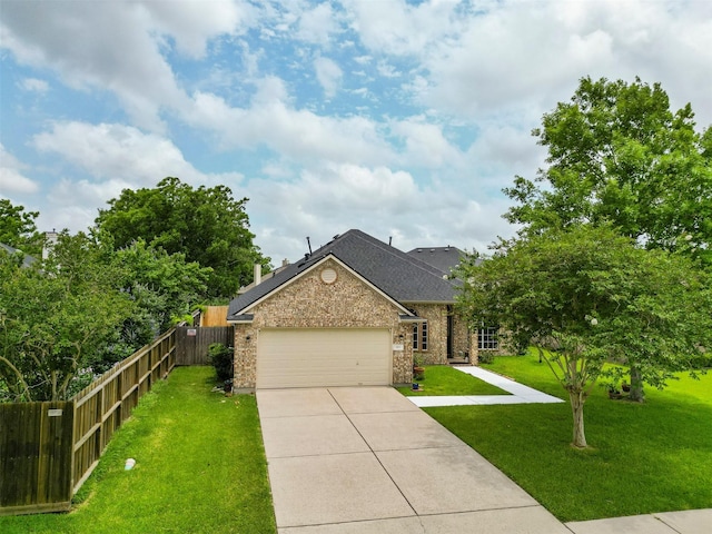 411 Ceole Ln, League City, TX 77573 - view of front of home featuring a garage, concrete driveway, brick siding, and roof with shingles