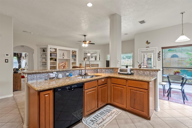 411 Ceole Ln, League City, TX 77573 - kitchen with black dishwasher, a sink, light tile patterned floors, ceiling fan, and open floor plan