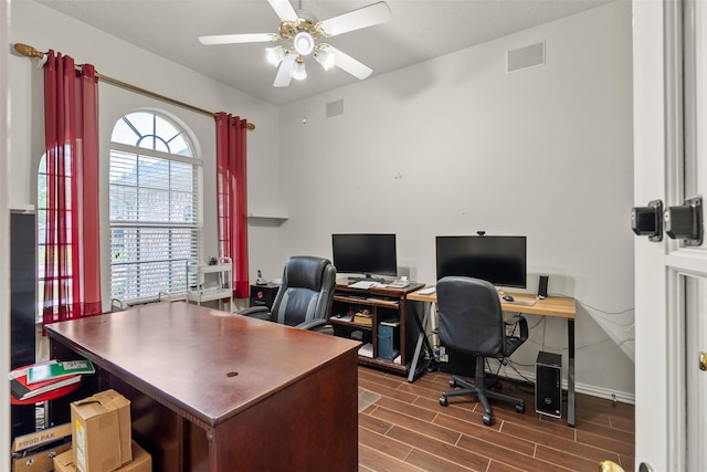 411 Ceole Ln, League City, TX 77573 - office area with wood finished floors, ceiling fan, and baseboards